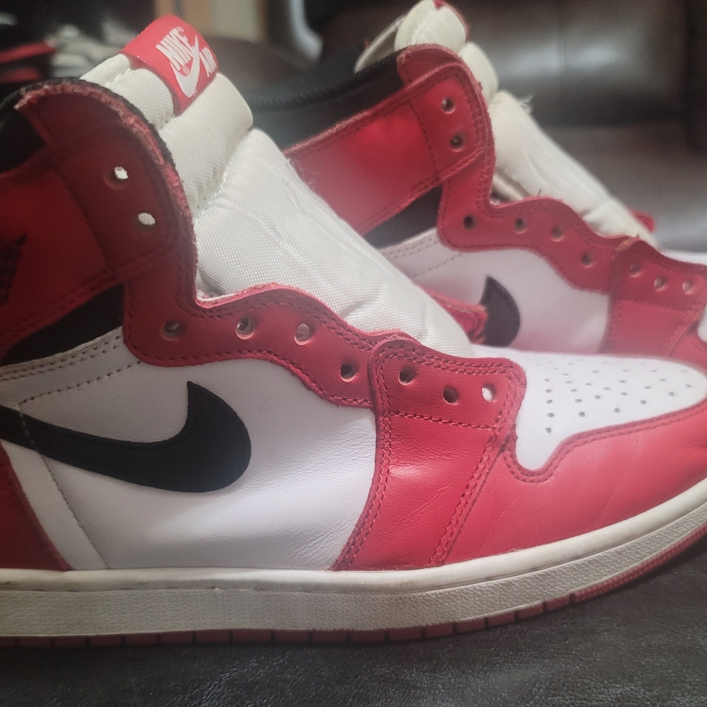 Nike Air Jordan Red and White Sneakers with Black Swoosh